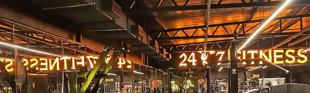 Upper crop of the exact gym interior with illuminated sign